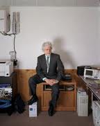 Paul sitting on desk